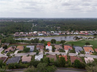 Stunning Rivera model home with fabulous lake and golf course on Herons Glen Golf and Country Club in Florida - for sale on GolfHomes.com, golf home, golf lot