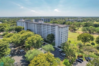 This fully remodeled unit features an open kitchen with white on Palm-Aire Country Club and Resort - Palms in Florida - for sale on GolfHomes.com, golf home, golf lot