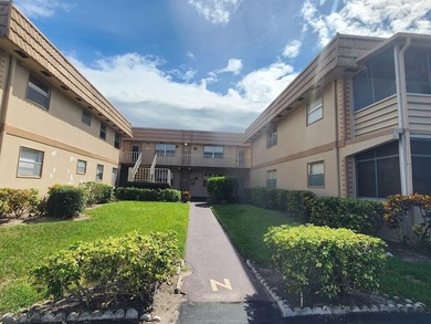 Charming 2-Bedroom, 2-Bath First-Floor Unit -55+ community! on Kings Point Golf - Executive in Florida - for sale on GolfHomes.com, golf home, golf lot