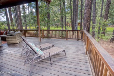 Beautifully renovated real log cabin on the fairway at Pinetop on Pinetop Lakes Country Club in Arizona - for sale on GolfHomes.com, golf home, golf lot