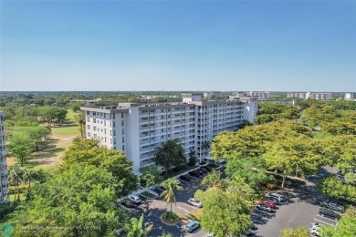 This fully remodeled unit features an open kitchen with white on Palm-Aire Country Club and Resort - Palms in Florida - for sale on GolfHomes.com, golf home, golf lot