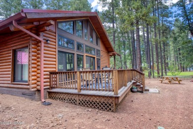 Beautifully renovated real log cabin on the fairway at Pinetop on Pinetop Lakes Country Club in Arizona - for sale on GolfHomes.com, golf home, golf lot