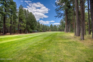 Beautifully renovated real log cabin on the fairway at Pinetop on Pinetop Lakes Country Club in Arizona - for sale on GolfHomes.com, golf home, golf lot