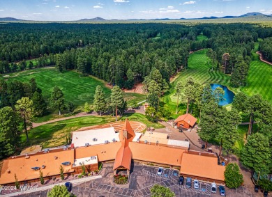 Beautifully renovated real log cabin on the fairway at Pinetop on Pinetop Lakes Country Club in Arizona - for sale on GolfHomes.com, golf home, golf lot