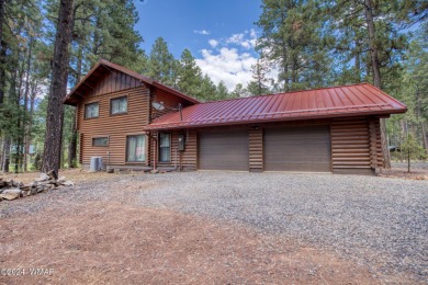 Beautifully renovated real log cabin on the fairway at Pinetop on Pinetop Lakes Country Club in Arizona - for sale on GolfHomes.com, golf home, golf lot