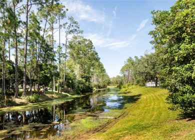 Honey Stop the car this is a must see Home! This delightful 4 on The Grand Club Cypress Course in Florida - for sale on GolfHomes.com, golf home, golf lot