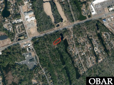 Outstanding Opportunity to own a large wooded building SITE in on Seascape Golf Links in North Carolina - for sale on GolfHomes.com, golf home, golf lot