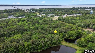 Outstanding Opportunity to own a large wooded building SITE in on Seascape Golf Links in North Carolina - for sale on GolfHomes.com, golf home, golf lot