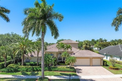 Step into a world of refined luxury and seclusion with on Weston Hills Country Club in Florida - for sale on GolfHomes.com, golf home, golf lot