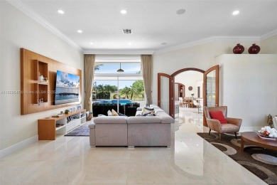 Step into a world of refined luxury and seclusion with on Weston Hills Country Club in Florida - for sale on GolfHomes.com, golf home, golf lot
