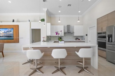 Step into a world of refined luxury and seclusion with on Weston Hills Country Club in Florida - for sale on GolfHomes.com, golf home, golf lot