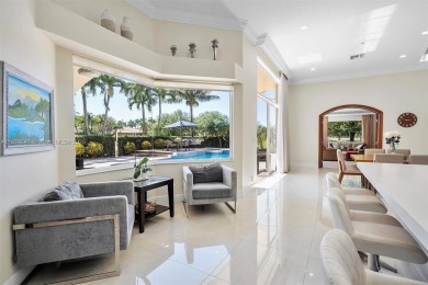 Step into a world of refined luxury and seclusion with on Weston Hills Country Club in Florida - for sale on GolfHomes.com, golf home, golf lot