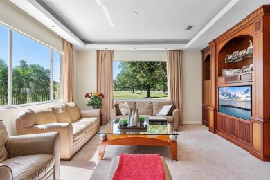 Step into a world of refined luxury and seclusion with on Weston Hills Country Club in Florida - for sale on GolfHomes.com, golf home, golf lot