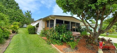 Come settle down and relax in a beautiful manufactured home with on Fairways Country Club in Florida - for sale on GolfHomes.com, golf home, golf lot