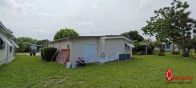 Come settle down and relax in a beautiful manufactured home with on Fairways Country Club in Florida - for sale on GolfHomes.com, golf home, golf lot