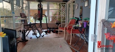 Come settle down and relax in a beautiful manufactured home with on Fairways Country Club in Florida - for sale on GolfHomes.com, golf home, golf lot
