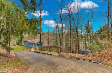 Charming, Cozy, and move in ready lake home with seasonal lake for sale on GolfHomes.com