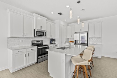 Rare Opportunity! Built in 2022 - Modern Home with Saltwater on Country Club of Florida in Florida - for sale on GolfHomes.com, golf home, golf lot