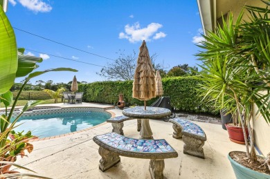 New Metal Roof! New AC! New Impact Windows! Pool! This home has on Atlantis Golf Club in Florida - for sale on GolfHomes.com, golf home, golf lot