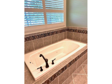 Lovely one level Craftsman Style 4 BR/ 3 BA home located in the on The Patriot Golf Club At Grand Harbor in South Carolina - for sale on GolfHomes.com, golf home, golf lot