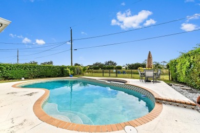 New Metal Roof! New AC! New Impact Windows! Pool! This home has on Atlantis Golf Club in Florida - for sale on GolfHomes.com, golf home, golf lot