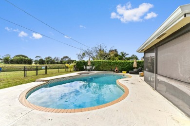 New Metal Roof! New AC! New Impact Windows! Pool! This home has on Atlantis Golf Club in Florida - for sale on GolfHomes.com, golf home, golf lot