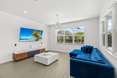 Rare Opportunity! Built in 2022 - Modern Home with Saltwater on Country Club of Florida in Florida - for sale on GolfHomes.com, golf home, golf lot