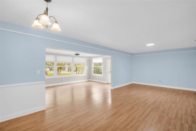 Beautifully updated and move-in ready, this 2-bedroom, 2-bath on Highland Lakes Executive Golf Course in Florida - for sale on GolfHomes.com, golf home, golf lot