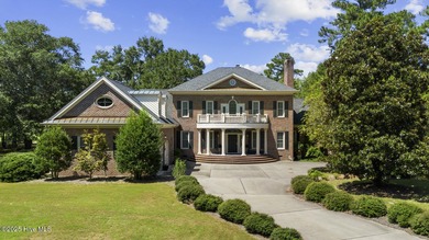 This beautiful brick home in River Landing seamlessly blends on River Landing Golf Course in North Carolina - for sale on GolfHomes.com, golf home, golf lot