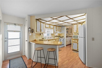 Indulge in breathtaking panoramic golf course views and on Maple Leaf Golf and Country Club in Florida - for sale on GolfHomes.com, golf home, golf lot
