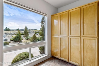 Behind the private gates of ArrowCreek, this thoughtfully on  in Nevada - for sale on GolfHomes.com, golf home, golf lot