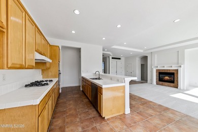 Behind the private gates of ArrowCreek, this thoughtfully on  in Nevada - for sale on GolfHomes.com, golf home, golf lot