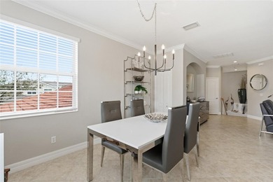 Discover refined luxury and effortless Florida living in this on Heritage Landing Golf  in Florida - for sale on GolfHomes.com, golf home, golf lot