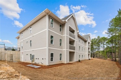 This beautiful two bedroom, two bathroom luxury condo in Fairway on Anderson Creek Golf Club in North Carolina - for sale on GolfHomes.com, golf home, golf lot