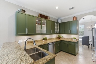 Discover refined luxury and effortless Florida living in this on Heritage Landing Golf  in Florida - for sale on GolfHomes.com, golf home, golf lot