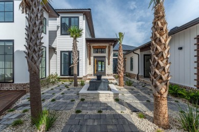 Pristinely poised on the coveted west-facing shores of Driftwood on Sandestin Golf and Beach Resort - Raven in Florida - for sale on GolfHomes.com, golf home, golf lot