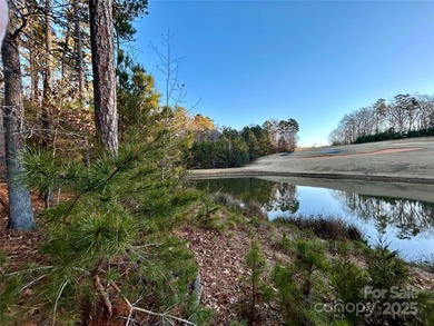 Build your dream home on this incredible lot overlooking the on The Tillery Tradition Country Club in North Carolina - for sale on GolfHomes.com, golf home, golf lot