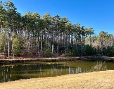 Build your dream home on this incredible lot overlooking the on The Tillery Tradition Country Club in North Carolina - for sale on GolfHomes.com, golf home, golf lot