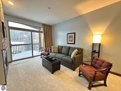 Enjoy a view of the pool from this nicely updated 1 bedroom on Cedar River Golf Course in Michigan - for sale on GolfHomes.com, golf home, golf lot