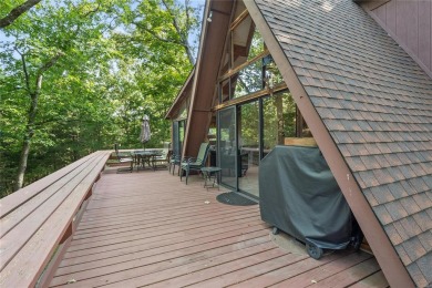 Nestled on a serene 2-acre lot at, this delightful A-frame home on Innsbrook Resort Golf Course in Missouri - for sale on GolfHomes.com, golf home, golf lot