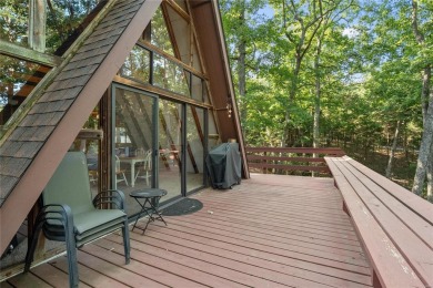 Nestled on a serene 2-acre lot at, this delightful A-frame home on Innsbrook Resort Golf Course in Missouri - for sale on GolfHomes.com, golf home, golf lot