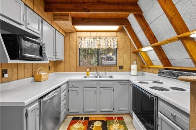 Nestled on a serene 2-acre lot at, this delightful A-frame home on Innsbrook Resort Golf Course in Missouri - for sale on GolfHomes.com, golf home, golf lot