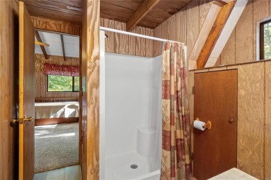 Nestled on a serene 2-acre lot at, this delightful A-frame home on Innsbrook Resort Golf Course in Missouri - for sale on GolfHomes.com, golf home, golf lot