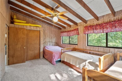 Nestled on a serene 2-acre lot at, this delightful A-frame home on Innsbrook Resort Golf Course in Missouri - for sale on GolfHomes.com, golf home, golf lot