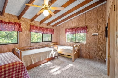 Nestled on a serene 2-acre lot at, this delightful A-frame home on Innsbrook Resort Golf Course in Missouri - for sale on GolfHomes.com, golf home, golf lot