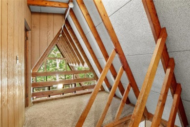 Nestled on a serene 2-acre lot at, this delightful A-frame home on Innsbrook Resort Golf Course in Missouri - for sale on GolfHomes.com, golf home, golf lot