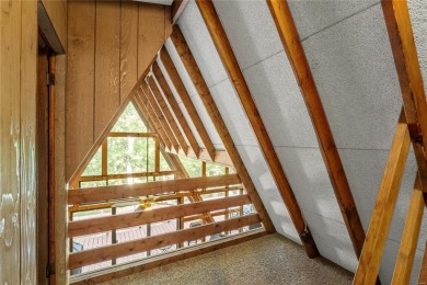 Nestled on a serene 2-acre lot at, this delightful A-frame home on Innsbrook Resort Golf Course in Missouri - for sale on GolfHomes.com, golf home, golf lot