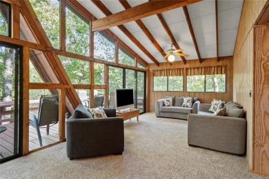 Nestled on a serene 2-acre lot at, this delightful A-frame home on Innsbrook Resort Golf Course in Missouri - for sale on GolfHomes.com, golf home, golf lot