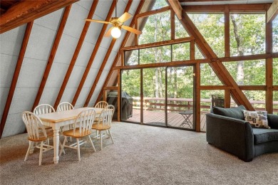 Nestled on a serene 2-acre lot at, this delightful A-frame home on Innsbrook Resort Golf Course in Missouri - for sale on GolfHomes.com, golf home, golf lot