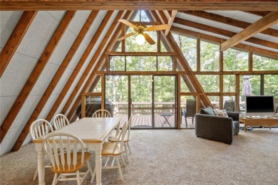 Nestled on a serene 2-acre lot at, this delightful A-frame home on Innsbrook Resort Golf Course in Missouri - for sale on GolfHomes.com, golf home, golf lot